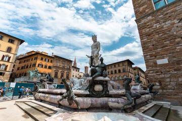 Fototapeta na wymiar Fountain of Neptune in Piazza della Signoria in Florence, Italy