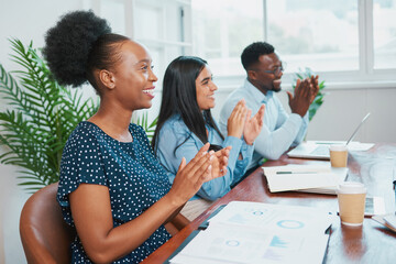 Colleagues clap at boardroom meeting, celebrate success good results