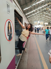 An Indian woman is posing in the ladies coach of Mumbai local train in India. Symbolize independent working woman   © Mrudang