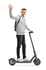 Generation z male riding an electirc scooter and waving at camera © Ljupco Smokovski