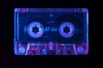 colorful cassette tape on a dark backdrop
