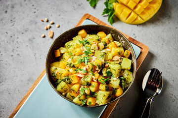 Dish with potatoes and fruits
