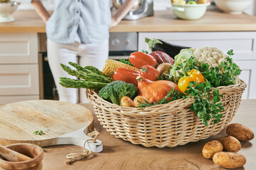Fresh various vegetables in basket at kitchen