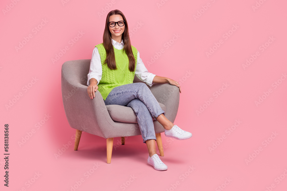 Wall mural full size photo of friendly professional psychology specialist woman waistcoat jeans sit on armchair