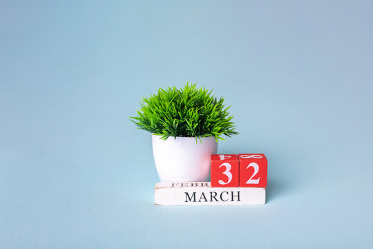 date April 1. Creative concept for April Fools' Day. Festive decor on blue background