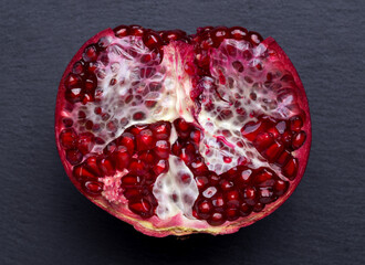 Large juicy pomegranate, bright and juicy fruit