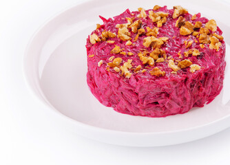 Traditional Beetroot salad with nuts on plate