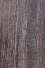 Marble texture with intense brown and beige veining structure.