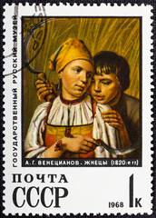 USSR - CIRCA 1968: A stamp printed in USSR shows a painting Reapers by Alexey Venetsianov.