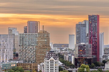 Fototapeta na wymiar Skyline of Rotterdam cityscape, Netherlands at sunset showing the skyscrapers and office buildings