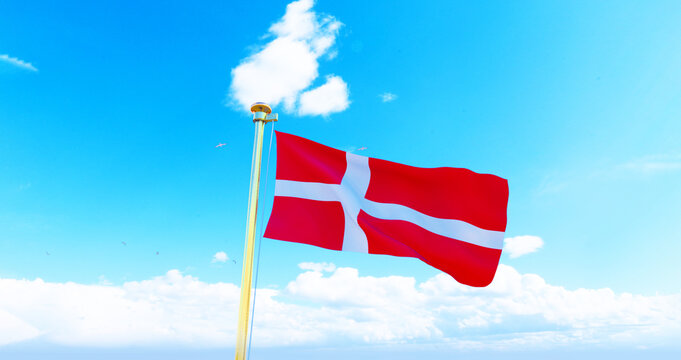 Denmark flag waving in beautiful sky. Flag of Denmark waving in the wind, sky and sun background. Denmark Flag. UHD. 