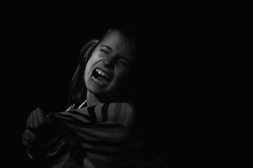 Conceptual image : mental health, stress, depression, panic attacks and anxiety in children. Silhouette nervous and over excited young girl screams for help. Copy space