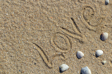 love message written in sand, background for design