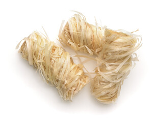 Top view of three wooden kindling rolls