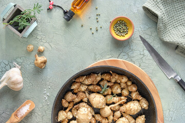 Fototapeta na wymiar topinambur and potatoes with herbes and spices