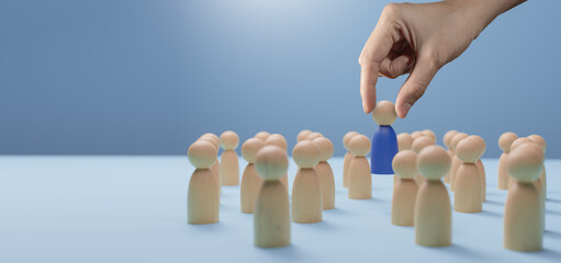 Job interview,recruitment,best,talent concepts.Selective new career recruitment sites.Job opportunity.Holding blue wooden people.Business leadership.recruitment concept.3D rendering and illustration.