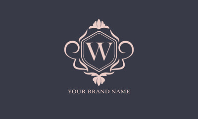 Exquisite baroque pattern. Floral ornament with initial letter W. Vintage frame, greeting card, wedding invitation. Vector logo template, label, business sign.
