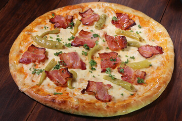 Pizza with bacon and pepper