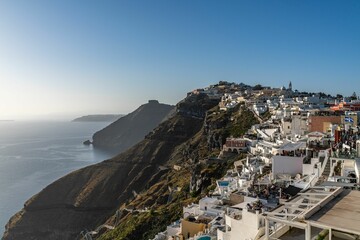 Coastal cityscape of densely populated Fira, the main town of Santorini island in Greece
