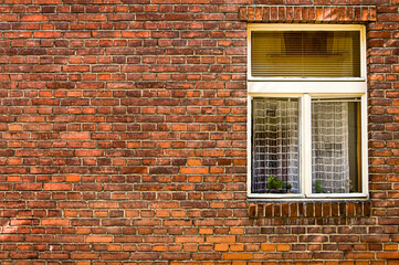 red bricks wall and window