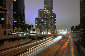 MARCH 13, 2023 - Los Angeles, CA: Night traffic view from the bridge in foggy day