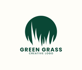 Negative space green grass logo