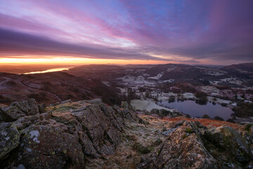 Beautiful sunrise over Windermere seen from Loughrigg Fell in The Lake District National Park.