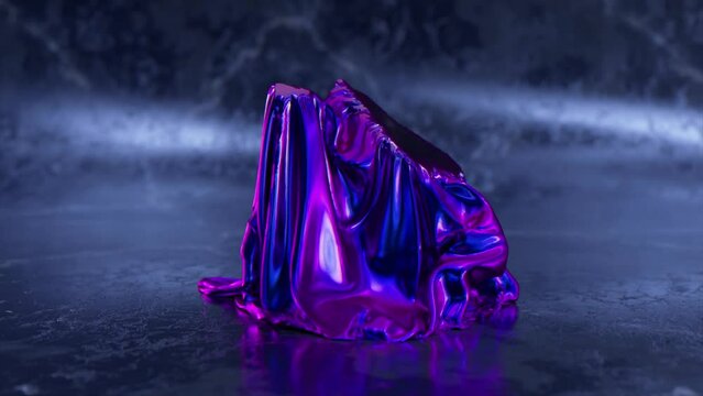 The large diamond turns into blue neon fabric on the floor. The blue fabric is inflated into a large bubble. 