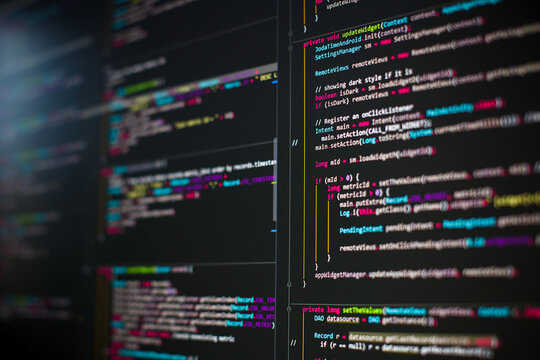 Software development. Lines of colorful code on the computer screen