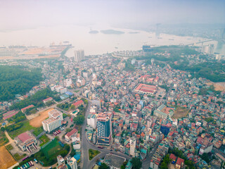 Aerial view of Bai Chay Bridge is located on Highway 18, connecting two parts of Ha Long City, Hon Gai City and Bai Chay City through Cua Luc Bay, which flows into Ha Long Bay