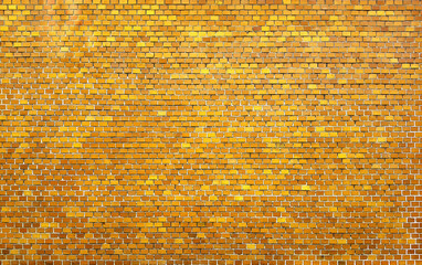 Yellow brick wall texture background.