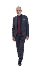 front view of a man walking with suit and tie  on white background