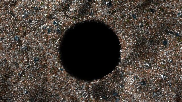 Black hole. Abstract space wallpaper. A universe filled with many particles. Slow and fast movement around. 3d animation
