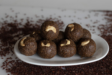 Poongar rice laddu. A healthy snack or ladoo made of poongar rice, jaggery and freshly grated coconut. A recipe with no ghee, no oil and no sugar