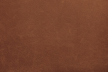 Genuine, natural, artificial orange leather texture background. Luxury material for header, banner, backdrop, wallpaper, clothes, furniture and interior design. ecological friendly leatherette.