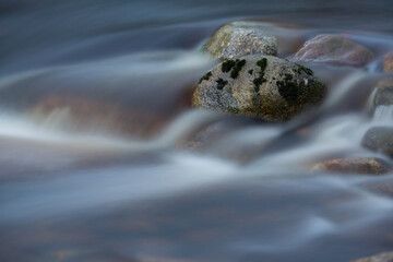 water flowing over rocks