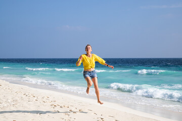 beautiful woman having fun on a tropical beach