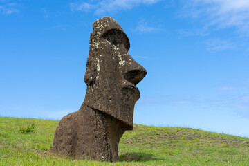 Moai Piro Piro close up at Rano Raraku on Easter Island (Rapa Nui), Chile. Rano Raraku is commonly known as the “Moai Factory”.