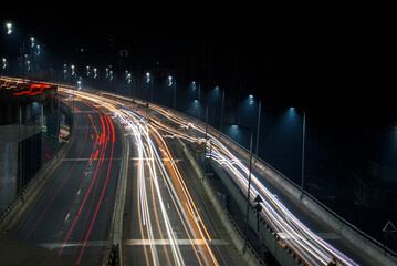 Fototapeta na wymiar traffic on highway at night chittagong Bangladesh