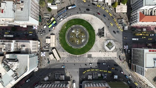 Aerial drone video of famous urban busy round square of Omonia in the heart of Athens historic centre, Attica, Greece