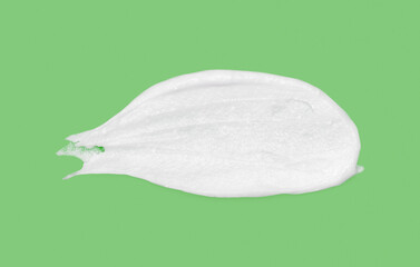 White cosmetic cream texture skincare lotion swatch. Face creme body moisturizer, hair conditioner smear smudge stroke on color background. Creamy beauty product close up. Shampoo, balm. Ointment