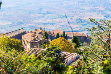 Cortona, Italy. View of the upper part of the city and the Val di Chiana