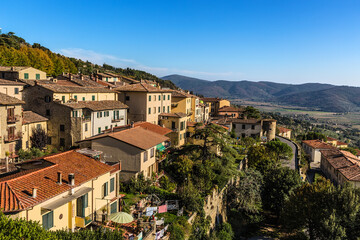 Fototapeta na wymiar Cortona, Italy. Scenic view of medieval town under Tuscany sky
