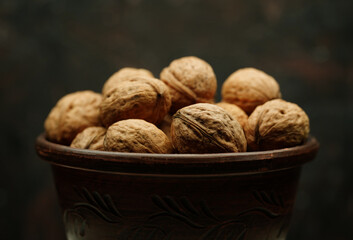 Walnut close up on a wooden table. Walnut close up. product rich in minerals and vitamins.