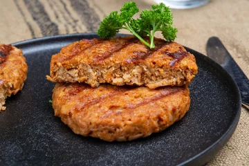 Tasty vegan burgers made from vegetarian plant based soya beans imitation meat © barmalini