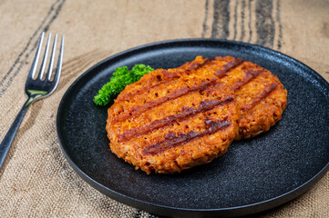 Tasty vegan burgers made from vegetarian plant based soya beans imitation meat