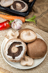 Tasty vegetarian food, large brown champignons Agaricus bisporus portobello mushrooms