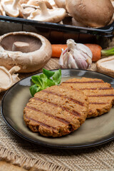 Tasty vegetarian burgers made from healthy quinoa, basil, portobello champignon and shiitake mushrooms
