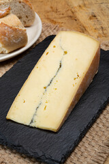 Cheese collection, French Morbier semi-soft cow milk cheese with black mold layer