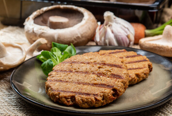 Tasty vegetarian burgers made from healthy quinoa, basil, portobello champignon and shiitake mushrooms